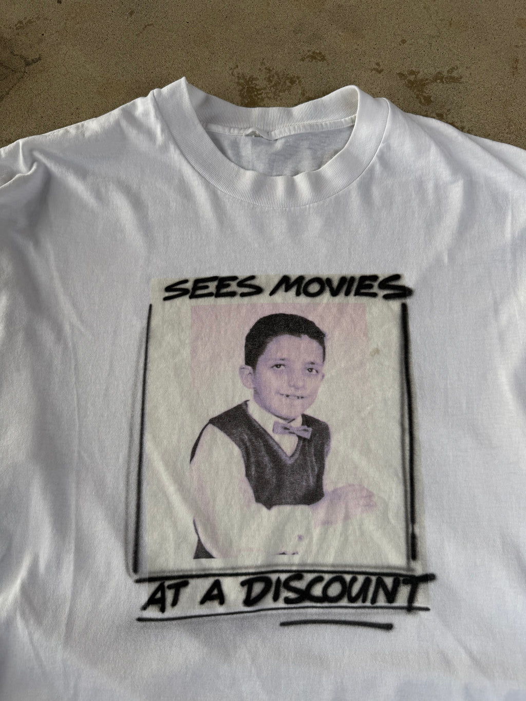 90s "Sees Movies at Discount" Comedy Tee | XL