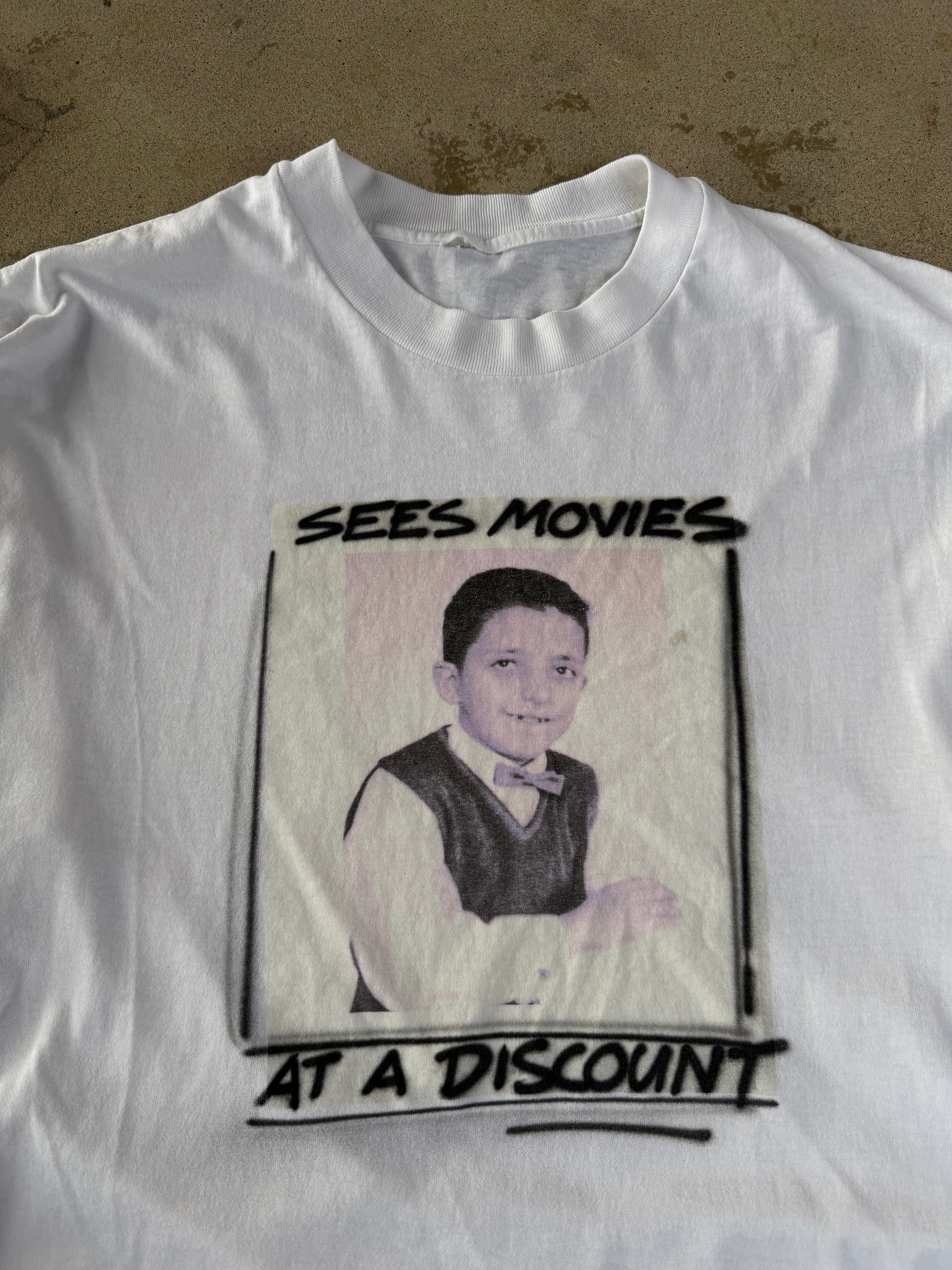 90s "Sees Movies at Discount" Comedy Tee | XL